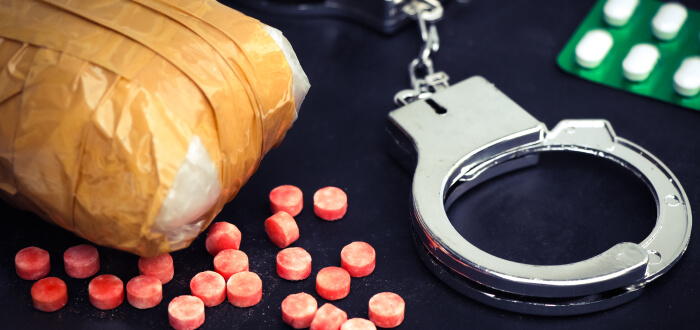 Handcuffs and drugs for a drug crime